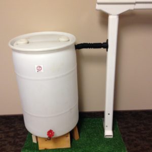 white rain barrel