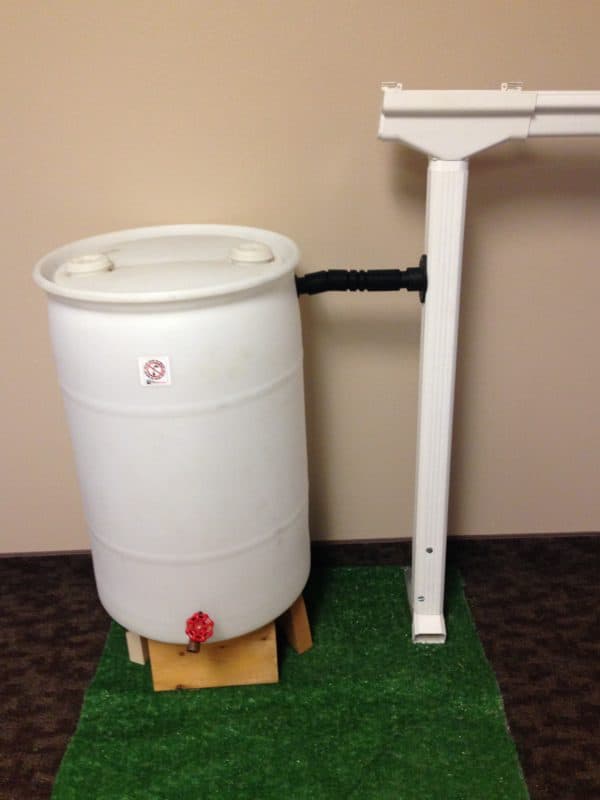 white rain barrel